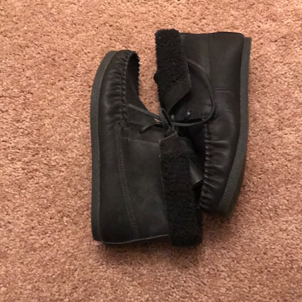 Black furry shoes